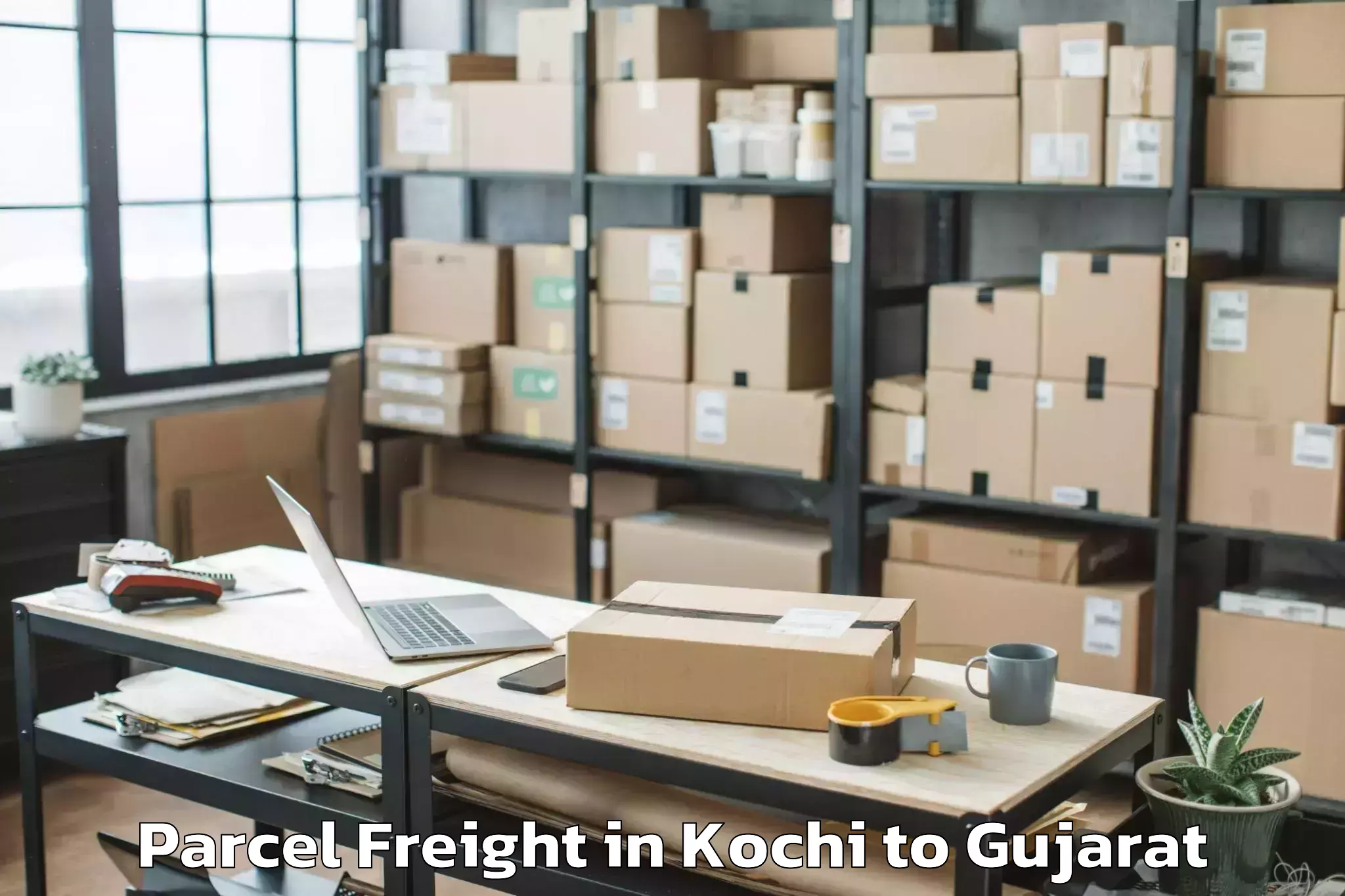 Easy Kochi to Bilimora Parcel Freight Booking